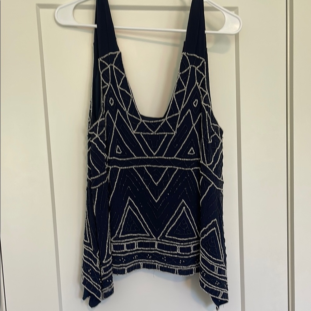 Asymmetric Beaded Tank